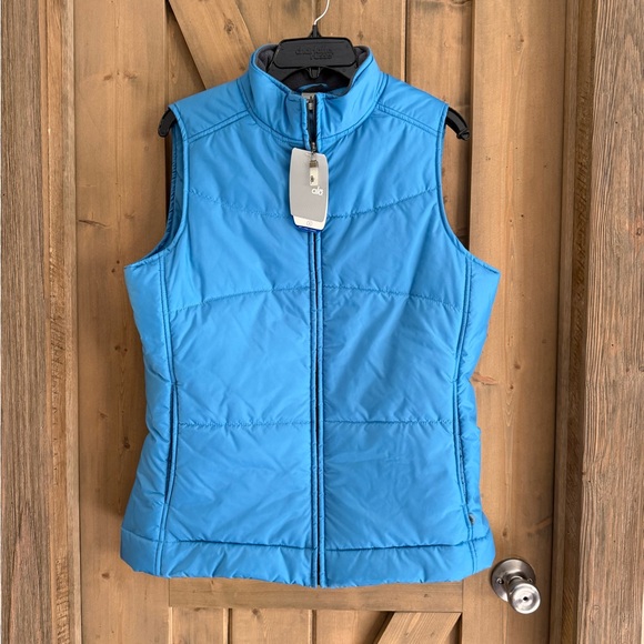 ALO Yoga Jackets & Blazers - ALO Yoga Womens Blue
Quilted Puffer Vest Size XL
Athleisure Outdoor Gorpcore
NWT